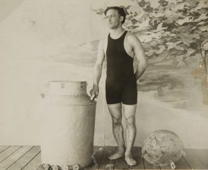 Harry Houdini with a milk can