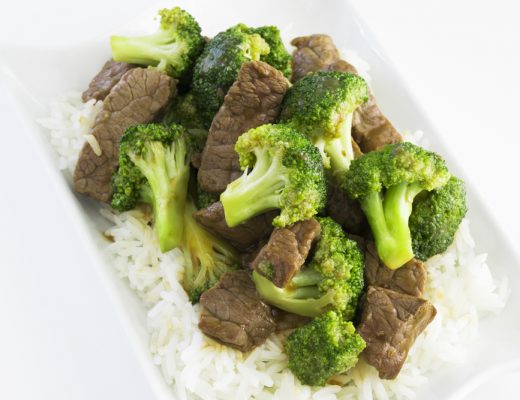 A plate of Broccoli Beef Stew over rice