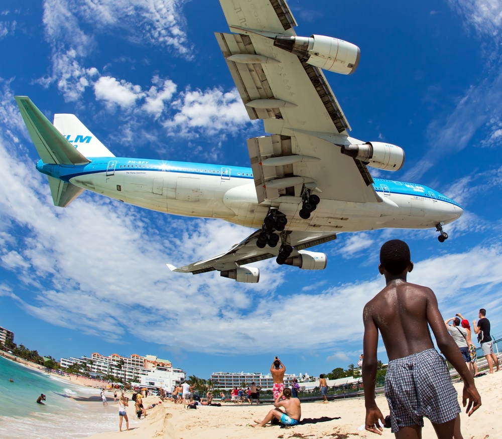 Airplane landing in Princess Juliana International Airport in St. Maarten one of the World's Scariest Airports