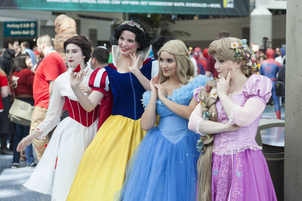 Cosplayers dressed up as Disney princesses at the annual WonderCon comic and entertainment convention in Los Angeles