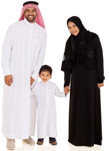 A family in traditional Qatari clothing.