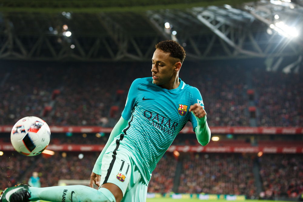 Brazilian Neymar singed with French Paris Saint-Germain, club owned by Qatar sports investment