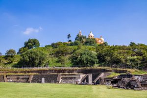 A church sitting on top of the Great Pyramid of Cholula.