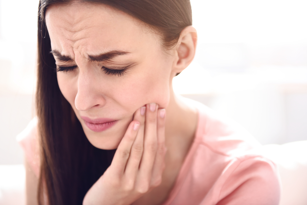 cure hurting tooth pain with one of these toothache remedies