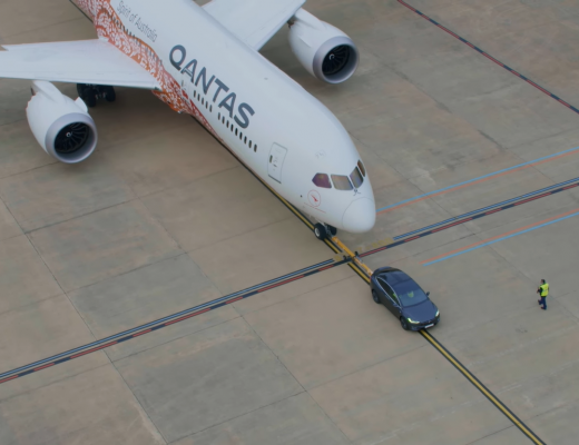 the tesla model x electric car just teamed up with qantas to break a guinness world record