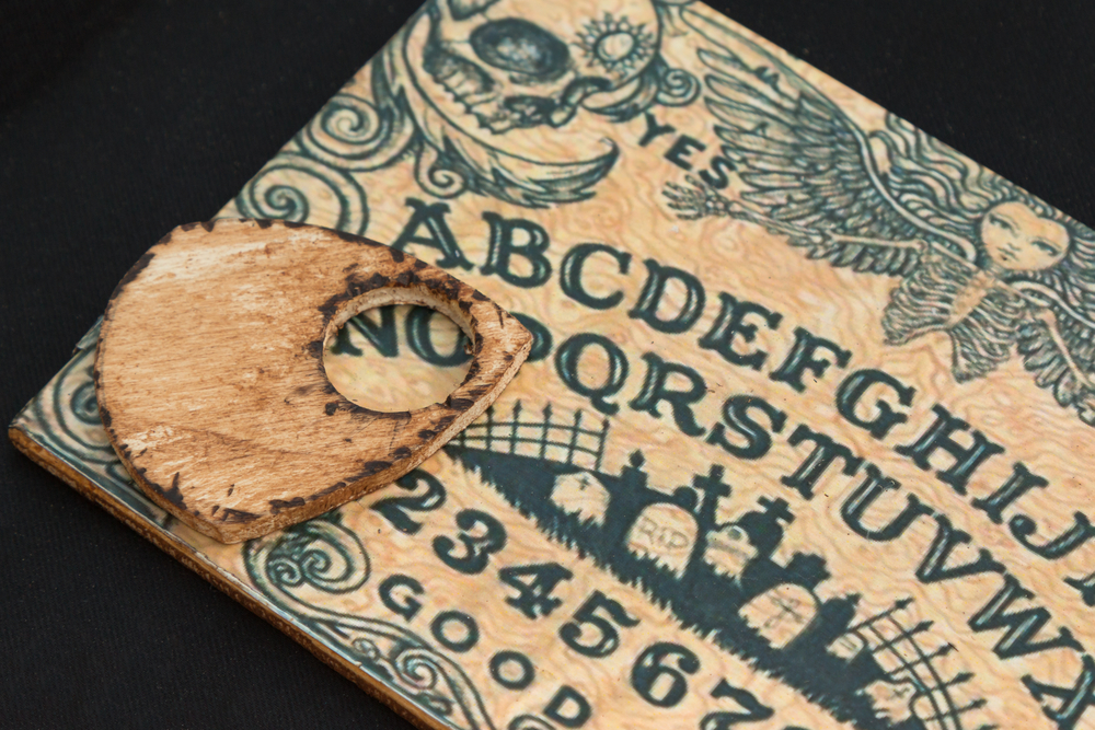 An ouija board is said to help mediums communicate with the dead
